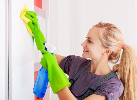 Professional Harrow cleaners beginning a careful cleaning service