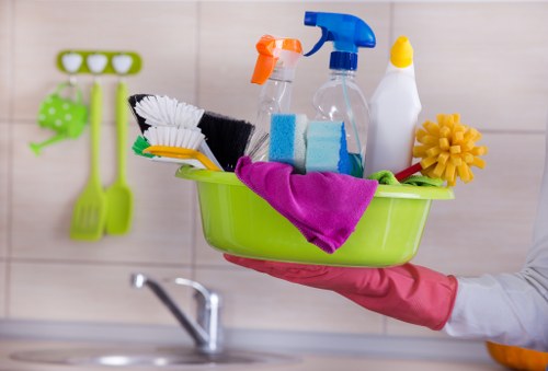 Worker using protective equipment while handling cleaning products safely