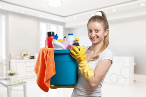 Supervisor reviewing safe cleaning practices and workplace precautions